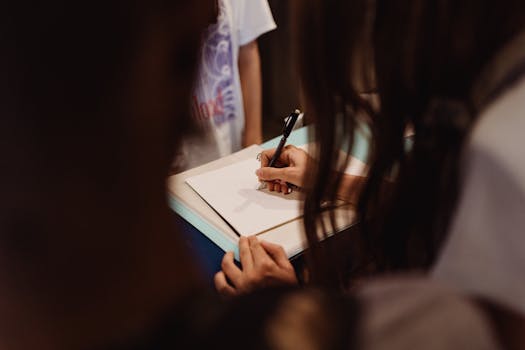 a notepad with written affirmations